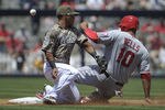 SAN DIEGO, CA - MAY 20:  Vernon Wells #10 of the Los Angeles Angels of Anaheim steals second base as Alexi Amarista #5 of the San Diego Padres loses the ball during the second inning of a baseball game at Petco Park on May 20, 2012 in San Diego, California.  (Photo by Denis Poroy/Getty Images)
