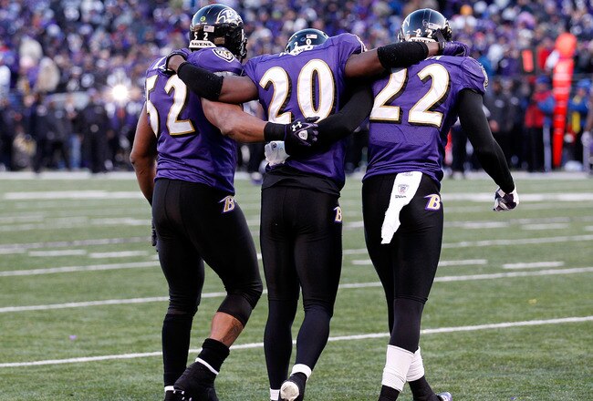 BALTIMORE, MD - JANUARY 15:  Ray Lewis #52 and  Jimmy Smith #22 help Ed Reed #20 of the Baltimore Ravens off the field late in the fourth quarter of the Ravens 20-13 win over the Houston Texans during the AFC Divisional playoff game at M&T Bank Stadium on January 15, 2012 in Baltimore, Maryland.  (Photo by Rob Carr/Getty Images)