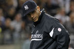 NEW YORK, NY - MAY 18:  Manager of the New York Yankees, Joe Girardi walks to the dugout agianst the Cincinnati Redsat Yankee Stadium on May 18, 2012 in the Bronx borough of New York City.  (Photo by Nick Laham/Getty Images)