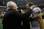 NEW ORLEANS, LA - SEPTEMBER 18:   Drew Brees #9 of the New Orleans Saints celebrates with team owner Tom Benson after defeating the Chicago Bears 30-13 at Louisiana Superdome on September 18, 2011 in New Orleans, Louisiana.  (Photo by Chris Graythen/Getty Images)