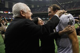 NEW ORLEANS, LA - SEPTEMBER 18:   Drew Brees #9 of the New Orleans Saints celebrates with team owner Tom Benson after defeating the Chicago Bears 30-13 at Louisiana Superdome on September 18, 2011 in New Orleans, Louisiana.  (Photo by Chris Graythen/Getty Images)