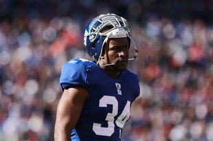 EAST RUTHERFORD, NJ - OCTOBER 30: Deon Grant #34 of the New York Giants against the Miami Dolphins at MetLife Stadium on October 30, 2011 in East Rutherford, New Jersey.  (Photo by Nick Laham/Getty Images)