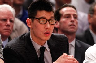 NEW YORK, NY - MAY 03:  Injured point guard Jeremy Lin #17 of the New York Knicks looks on from the bench against the Miami Heat in Game Three of the Eastern Conference Quarterfinals in the 2012 NBA Playoffs on May 3, 2012 at Madison Square Garden in New York City.  NOTE TO USER: User expressly acknowledges and agrees that, by downloading and or using this photograph, User is consenting to the terms and conditions of the Getty Images License Agreement.  (Photo by Jeff Zelevansky/Getty Images)