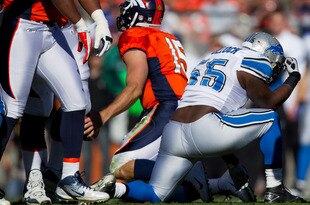 DENVER, CO - OCTOBER 30:  Linebacker Stephen Tulloch #55 of the Detroit Lions reacts by 'Tebowing' after making a sack on quarterback Tim Tebow #15 of the Denver Broncos during the first quarter at Sports Authority Field at Mile High on October 30, 2011 in Denver, Colorado. (Photo by Justin Edmonds/Getty Images)