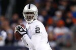 DENVER - DECEMBER 20:  Quarterback JaMarcus Russell #2 of the Oakland Raiders drops back to pass against the Denver Broncos in the fourth quarter at Invesco Field at Mile High on December 20, 2009 in Denver, Colorado. The Raiders defeated the Broncos 20-19.  (Photo by Jeff Gross/Getty Images)