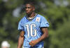 ALLEN PARK, MI - AUGUST 01: Titus Young #16 of the Detroit Lions watches the morning drills unable to practice due to muscle tightness at the Lions training facility on August 1, 2011 in Allen Park, Michigan.  (Photo by Leon Halip/Getty Images)
