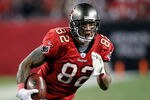 TAMPA, FL - DECEMBER 26:  Tight end Kellen Winslow #81 of the Tampa Bay Buccaneers runs after a catch against the Seattle Seahawks during the game at Raymond James Stadium on December 26, 2010 in Tampa, Florida.  (Photo by J. Meric/Getty Images)