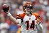 HOUSTON, TX - JANUARY 07:  Quarterback Andy Dalton #14 of the Cincinnati Bengals throws the ball in the first quarter while taking on the Houston Texans in their 2012 AFC Wild Card Playoff game at Reliant Stadium on January 7, 2012 in Houston, Texas.  (Photo by Jamie Squire/Getty Images)