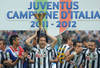 TURIN, ITALY - MAY 13:  Claudio Marchisio of Juventus FC celebrates with the Serie A trophy after the Serie A match between Juventus FC and Atalanta BC at Juventus Stadium on May 13, 2012 in Turin, Italy.  (Photo by Valerio Pennicino/Getty Images)
