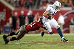 TAMPA, FL - OCTOBER 03: Tight end Dallas Clark #44 of the Indianapolis Colts runs the ball against Safety Sean Jones #26 of the Tampa Bay Buccaneers at Raymond James Stadium on October 3, 2011 in Tampa, Florida. (Photo by Marc Serota/Getty Images)