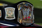 FORT WORTH, TX - NOVEMBER 07:  A replica of the WWE world championship belt rests on top of Kyle Busch's #18 Z-Line Designs/WWE Smackdown Toyota prior to the start of the NASCAR Nationwide Series O'Reilly Challenge at Texas Motor Speedway on November 7, 2009 in Fort Worth, Texas.  (Photo by Robert Laberge/Getty Images for NASCAR)