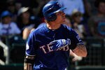 SURPRISE, AZ - MARCH 11:  Josh Hamilton #32 of the Texas Rangers plays against the Cleveland Indians during a spring training baseball game at Surprise Stadium on March 11, 2012 in Surprise, Arizona.  (Photo by Kevork Djansezian/Getty Images)