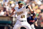 OAKLAND, CA - APRIL 22:  Ryan Cook #48 of the Oakland Athletics pitches against the Cleveland Indians at O.co Coliseum on April 22, 2012 in Oakland, California.  (Photo by Ezra Shaw/Getty Images)
