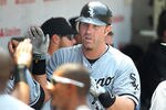 CHICAGO, IL - MAY 20: Adam Dunn #32 of Chicago White Sox celebrates after hitting a solo home run in the top of the fourth inning against the Chicago Cubs during Interleague the game at Wrigley Field on May 20, 2012 in Chicago, Illinois. (Photo by Mike McGinnis/Getty Images)