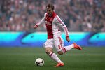 AMSTERDAM, NETHERLANDS - MAY 02:  Christian Eriksen of Ajax in action during the Eredivisie match between Ajax Amsterdam and VVV Venlo at Amsterdam Arena on May 2, 2012 in Amsterdam, Netherlands.  (Photo by Dean Mouhtaropoulos/Getty Images)