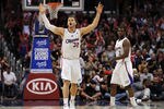 LOS ANGELES, CA - APRIL 22:  Blake Griffin #32 of the Los Angeles Clippers reacts with Chris Paul #3 after a Clipper three pointer during the game against the New Orleans Hornets at Staples Center on April 22, 2012 in Los Angeles, California.  NOTE TO USER: User expressly acknowledges and agrees that, by downloading and or using this photograph, User is consenting to the terms and conditions of the Getty Images License Agreement.  (Photo by Harry How/Getty Images)
