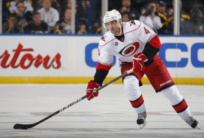 BUFFALO, NY - OCTOBER 14: Jamie McBain #4 of the Carolina Hurricanes skates against the Buffalo Sabres during their NHL game at First Niagara Center October 14, 2011 in Buffalo, New York. (Photo by Dave Sandford/Getty Images)