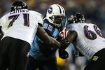 NASHVILLE, TN - JANUARY 10:  (M) Defensive tackle Albert Haynesworth #93 of the Tennessee Titans is double-teammed by lineman Jared Gaither #71 and Ben Grubbs #66 of the Baltimore Ravens during the AFC Divisional Playoff Game on January 10, 2009 at LP Field in Nashville, Tennessee.  (Photo by Jonathan Daniel/Getty Images)