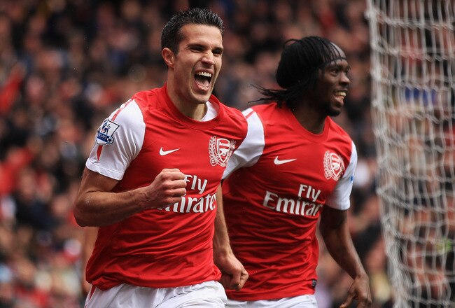 LONDON, ENGLAND - MAY 05:  Robin van Persie of Arsenal celebrates scoring their third goal during the Barclays Premier League match between Arsenal and Norwich City at the Emirates Stadium on May 5, 2012 in London, England.  (Photo by Bryn Lennon/Getty Images)