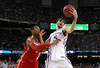 NEW ORLEANS, LA - MARCH 31:  Jeff Withey #5 of the Kansas Jayhawks with the ball against Jared Sullinger #0 of the Ohio State Buckeyes in the second half during the National Semifinal game of the 2012 NCAA Division I Men's Basketball Championship at the Mercedes-Benz Superdome on March 31, 2012 in New Orleans, Louisiana.  (Photo by Chris Graythen/Getty Images)