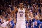 OKLAHOMA CITY, OK - MAY 21:  Kevin Durant #35 of the Oklahoma City Thunder reacts after a three-point shot against the Los Angeles Lakers during Game Five of the Western Conference Semifinals of the 2012 NBA Playoffs at Chesapeake Energy Arena on May 21, 2012 in Oklahoma City, Oklahoma.  NOTE TO USER: User expressly acknowledges and agrees that, by downloading and or using this photograph, User is consenting to the terms and conditions of the Getty Images License Agreement.  (Photo by Ronald Martinez/Getty Images)
