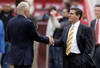 LANDOVER, MD - NOVEMBER 20: Dallas Cowboys owner Jerry Jones (L) shakes hands with Washington Redskins owner Daniel Snyder (R) before the start of Redskins and Cowboys game at FedExField on November 20, 2011 in Landover, Maryland.  (Photo by Rob Carr/Getty Images)