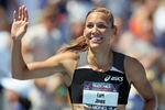 DES MOINES, IA - JUNE 26:  Lolo Jones waves to the crowd after winning the Womens 100 Meter Hurdles during the 2010 USA Outdoor Track & Field Championships at Drake Stadium on June 26, 2010 in Des Moines, Iowa.  (Photo by Andy Lyons/Getty Images)