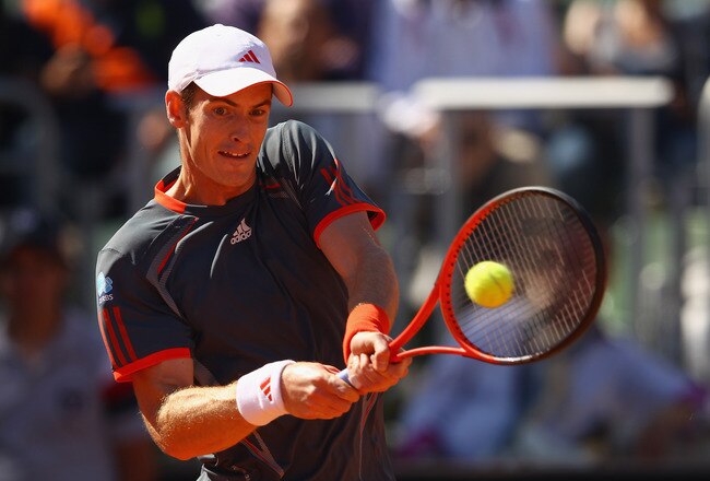 ROME, ITALY - MAY 17:  Andy Murray of Great Britain plays a backhand against Richard Gasquet of France in their third round match during day six of the Internazionali BNL d'Italia 2012 at the Foro Italico Tennis Centre on May 17, 2012 in Rome, Italy.  (Photo by Clive Brunskill/Getty Images)