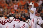 GLENDALE, AZ - JANUARY 02:  Andrew Luck #12 of the Stanford Cardinal gestures at the line against the Oklahoma State Cowboys during the Tostitos Fiesta Bowl on January 2, 2012 at University of Phoenix Stadium in Glendale, Arizona.  (Photo by Doug Pensinger/Getty Images)