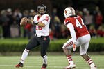 LOUISVILLE, KY - OCTOBER 21:  Gary Nova #15 of the Rutgers Scarlet Knights throws a pass during the game against the Louisville Cardinals at Papa John's Cardinal Stadium on October 21, 2011 in Louisville, Kentucky.  (Photo by Andy Lyons/Getty Images)