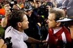AUBURN, AL - NOVEMBER 26:  Head coach Nick Saban of the Alabama Crimson Tide shakes hands with head coach Gene Chizik of the Auburn Tigers after the Crimson Tide's 42-14 win at Jordan-Hare Stadium on November 26, 2011 in Auburn, Alabama.  (Photo by Kevin C. Cox/Getty Images)