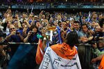 MUNICH, GERMANY - MAY 19:  Didier Drogba of Chelsea celebrates with the trophy in front of their fans after their victory in the UEFA Champions League Final between FC Bayern Muenchen and Chelsea at the Fussball Arena München on May 19, 2012 in Munich, Germany.  (Photo by Alex Livesey/Getty Images)