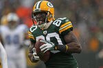 GREEN BAY, WI - JANUARY 01:  Donald Driver #80 of the Green Bay Packers reacts as he scores a touchdown against the Detroit Lions at Lambeau Field on January 1, 2012 in Green Bay, Wisconsin. The Packers defeated the Lions 45-41.  (Photo by Jonathan Daniel/Getty Images)