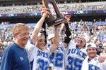 BALTIMORE, MD - MAY 31:  Head coach John Danowski, Sam Payton #32, Ned Crotty #22, Parker McKee #35, and Max Quinzani #9 of the Duke Blue Devils celebrate winning the 2010 NCAA Division 1 Lacrosse Championship against the Notre Dame Fighting Irish on May 31, 2010 at M&T Bank Stadium in Baltimore, Maryland.  (Photo by Mitchell Layton/Getty Images)