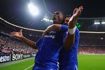 MUNICH, GERMANY - MAY 19:  Didier Drogba of Chelsea celebrates with team mate Juan Mata after scoring his team’s first goal during UEFA Champions League Final between FC Bayern Muenchen and Chelsea at the Fussball Arena München on May 19, 2012 in Munich, Germany.  (Photo by Laurence Griffiths/Getty Images)