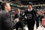 ST PAUL, MN - JUNE 25:  Executive Vice President & General Manager Kevin Cheveldayoff of the Winnipeg Jets greets 78th overall pick Brennan Serville by the Winnipeg Jets during day two of the 2011 NHL Entry Draft at Xcel Energy Center on June 25, 2011 in St Paul, Minnesota.  (Photo by Bruce Bennett/Getty Images)