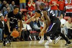 LAS VEGAS - DECEMBER 17:  Tre'Von Willis #33 of the UNLV Rebels goes for a steal between Damian Lillard #1 and Matt Washington #33 of the Weber State Wildcats during their game at the Thomas & Mack Center December 17, 2009 in Las Vegas, Nevada.  (Photo by Ethan Miller/Getty Images)