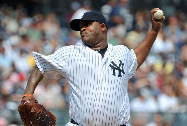 NEW YORK, NY - SEPTEMBER 04: CC Sabathia #52 of the New York Yankees throws a pitch in the top of the first inning against the Toronto Blue Jays on September 4, 2011 at Yankee Stadium in the Bronx borough of New York City. (Photo by Christopher Pasatieri/Getty Images)