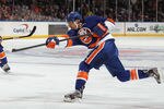 UNIONDALE, NY - MARCH 29: P.A. Parenteau #15 of the New York Islanders skates against the Pittsburgh Penguins at the Nassau Veterans Memorial Coliseum on March 29, 2012 in Uniondale, New York. The Islanders defeated the Penguins 5-3.  (Photo by Bruce Bennett/Getty Images)