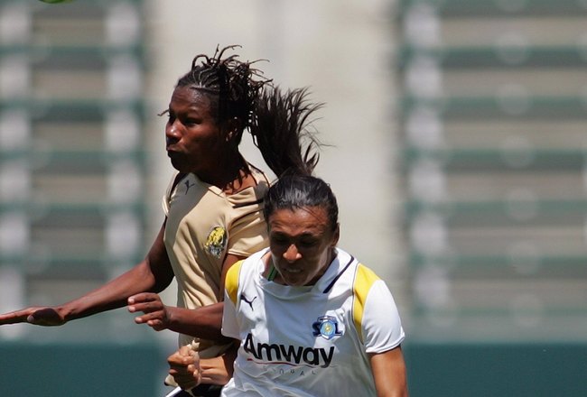 CARSON, CA - APRIL 19:  Kandace Wilson #9 of FC Gold Pride goes up for the header against Marta #10 of the Los Angeles Sol during the WPS match at The Home Depot Center on April 19, 2009 in Carson, California. (Photo by Victor Decolongon/Getty Images)