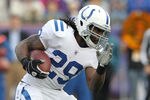 FOXBORO, MA - DECEMBER 4:  Joseph Addai #29 of the Indianapolis Colts  runs the ball against the New England Patriots on December 4, 2011 in Foxboro, Massachusetts. (Photo by Jim Rogash/Getty Images)