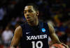 ATLANTA, GA - MARCH 23:  Mark Lyons #10 of the Xavier Musketeers controls the ball against the Baylor Bears during the 2012 NCAA Men's Basketball South Regional Semifinal game at the Georgia Dome on March 23, 2012 in Atlanta, Georgia.  (Photo by Streeter Lecka/Getty Images)