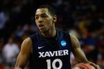 ATLANTA, GA - MARCH 23:  Mark Lyons #10 of the Xavier Musketeers controls the ball against the Baylor Bears during the 2012 NCAA Men's Basketball South Regional Semifinal game at the Georgia Dome on March 23, 2012 in Atlanta, Georgia.  (Photo by Streeter Lecka/Getty Images)