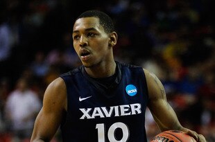 ATLANTA, GA - MARCH 23:  Mark Lyons #10 of the Xavier Musketeers controls the ball against the Baylor Bears during the 2012 NCAA Men's Basketball South Regional Semifinal game at the Georgia Dome on March 23, 2012 in Atlanta, Georgia.  (Photo by Streeter Lecka/Getty Images)