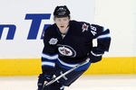 WINNIPEG, CANADA - DECEMBER 01: Carl Klingberg #48 of the Winnipeg Jets skates during warmup before a game against the Phoenix Coyotes in NHL action at the MTS Centre on December 1, 2011 in Winnipeg, Manitoba, Canada. (Photo by Marianne Helm/Getty Images)