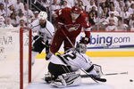 GLENDALE, AZ - MAY 22:  Mikkel Boedker #89 of the Phoenix Coyotes leaps over goaltender Jonathan Quick #32 of the Los Angeles Kings in Game Five of the Western Conference Final during the 2012 NHL Stanley Cup Playoffs at Jobing.com Arena on May 22, 2012 in Phoenix, Arizona.  (Photo by Jeff Gross/Getty Images)