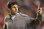 FAYETTEVILLE, AR - NOVEMBER 12:   Head Coach Derek Dooley of the Tennessee Volunteers signals to the sidelines during a game against the Arkansas Razorbacks at Donald W. Reynolds Stadium Stadium on November 12, 2011 in Fayetteville, Arkansas.  The Razorbacks defeated the Volunteers 49 to 7.  (Photo by Wesley Hitt/Getty Images)