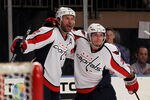 NEW YORK, NY - APRIL 30:  (L-R) Mike Knuble #22 oand Keith Aucoin #23 of the Washington Capitals celebrate after Knuble scored a first period goal against the New York Rangers in Game Two of the Eastern Conference Semifinals during the 2012 NHL Stanley Cup Playoffs at Madison Square Garden on April 30, 2012 in New York City.  (Photo by Bruce Bennett/Getty Images)