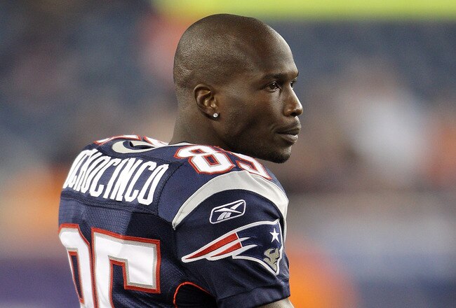 FOXBORO, MA - AUGUST 11:  Chad Ochocinco #85 of the New England Patriots watches the game from the sideline against the Jacksonville Jaguars on August 11, 2011 at Gillette Stadium in Foxboro, Massachusetts. The New England Patriots defeated the Jacksonville Jaguars 47-12.  (Photo by Elsa/Getty Images)