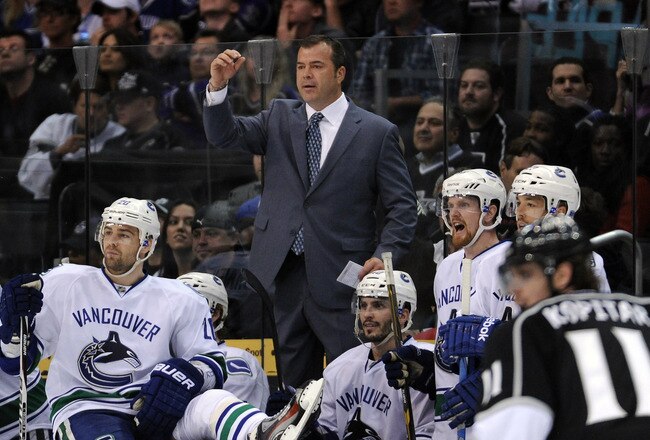 LOS ANGELES, CA - APRIL 18:  Head Coach Alain Vigneault of the Vancouver Canucks react to the officials call during a 3-1 win over the Los Angeles Kings at Staples Center on April 18, 2012 in Los Angeles, California.  (Photo by Harry How/Getty Images)